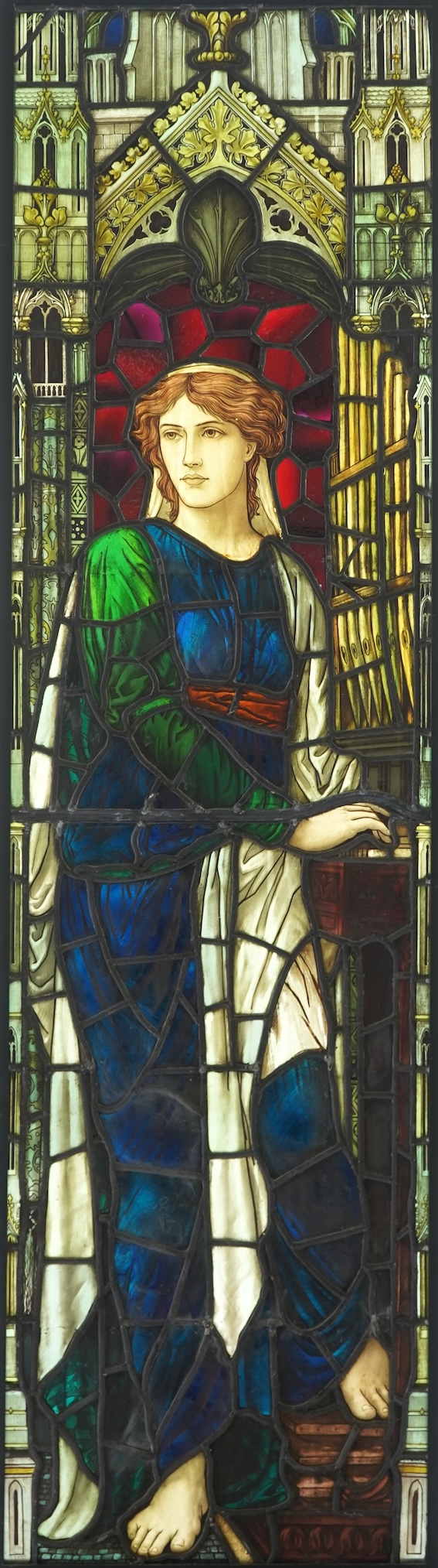 Attributed to Henry Holiday (1839-1927) for James Powell & Son: A stained and painted glass panel depicting St Cecilia